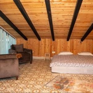 Ένα ή περισσότερα κρεβάτια σε δωμάτιο στο Lycian Village Luxury