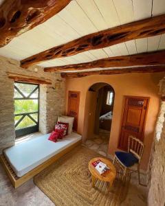 Letto o letti in una camera di Atlantis 12, Maison d'hôtes et d'art