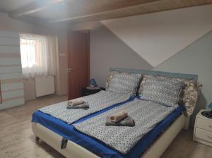 Posteľ alebo postele v izbe v ubytovaní Szofi Vendégház + 37 fotografií