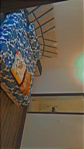 Ένα ή περισσότερα κρεβάτια σε δωμάτιο στο Swiss apartment Burban