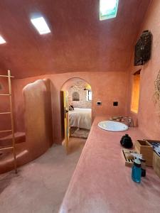 Letto o letti in una camera di Atlantis 12, Maison d'hôtes et d'art
