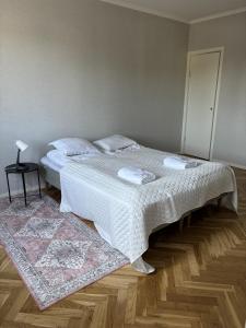 Postel nebo postele na pokoji v ubytování Säffle Suites by Svaneholm Hotel