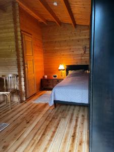 Llit o llits en una habitació de Atpūtas vieta “Ratuļi”