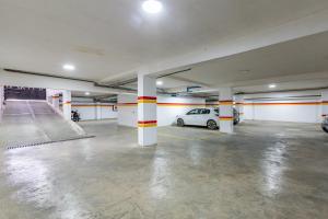 a parking garage with a car parked in it at Cocoon in Gueliz, Netflix, IPTV in Marrakech