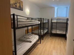 Posteľ alebo postele v izbe v ubytovaní Amber Hostel