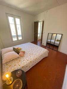 Ένα ή περισσότερα κρεβάτια σε δωμάτιο στο Superbe Appartement au coeur d ajaccio