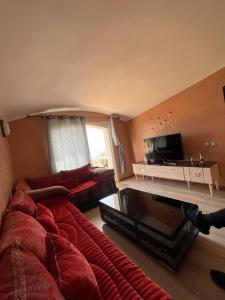Μια τηλεόραση ή/και κέντρο ψυχαγωγίας στο Appartement vue sur mer