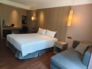 Kuchyň nebo kuchyňský kout v ubytování CHECK inn SELECT Taipei NeiHu
