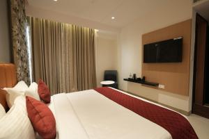 TV a/nebo společenská místnost v ubytování Hotel Cachet