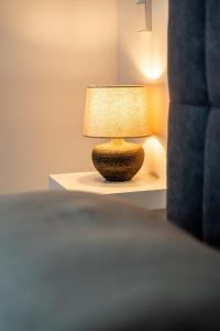 Ένα ή περισσότερα κρεβάτια σε δωμάτιο στο Dachidylle, stylish apartment with feel-good factor