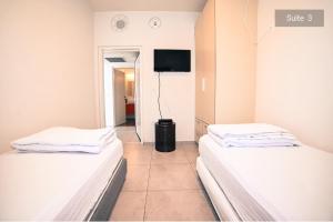 Uma cama ou camas num quarto em Magdala Resort 2BR With private pool