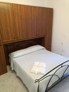 Posteľ alebo postele v izbe v ubytovaní Trulli in Martina Franca residence