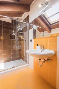 a bathroom with a sink and a shower at Villa Al Borgo - Villa with Private Garden in Salerno +39 photos
