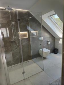 Koupelna v ubytování Éva Apartman