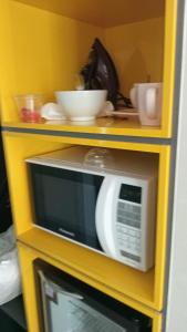 Kuchyň nebo kuchyňský kout v ubytování Flat em pinheiros equipado em hotel 4 stat