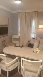TV a/nebo společenská místnost v ubytování Flat em pinheiros equipado em hotel 4 stat