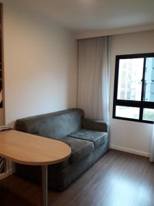 Posezení v ubytování Flat em pinheiros equipado em hotel 4 stat