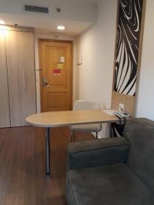 Posezení v ubytování Flat em pinheiros equipado em hotel 4 stat