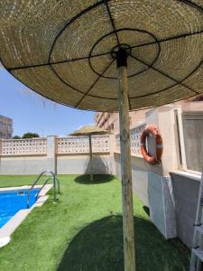 Swimmingpoolen hos eller tæt på Ático Cassinello Roquetas