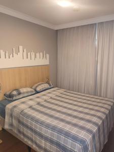 Postel nebo postele na pokoji v ubytování Flat em pinheiros equipado em hotel 4 stat