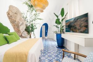 Una televisión o centro de entretenimiento en Villa Magia