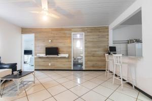 Kuchyň nebo kuchyňský kout v ubytování Casa Aconchegante com Churrasqueira