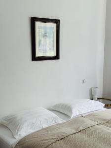 Łóżko lub łóżka w pokoju w obiekcie Willa Pałacyk