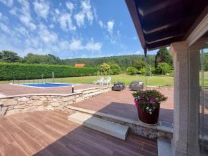 Bazén v ubytování Agro dos Mouriños nebo v jeho okolí