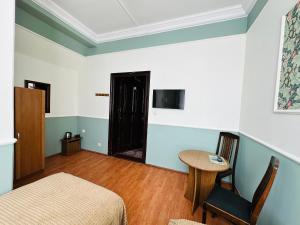 Telewizja i/lub zestaw kina domowego w obiekcie Willa Pałacyk