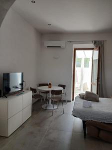 TV a/nebo společenská místnost v ubytování La Casina