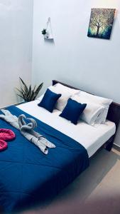 Postel nebo postele na pokoji v ubytování Hermanos Hideaway + 25 fotografií