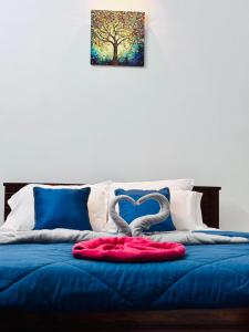 Postel nebo postele na pokoji v ubytování Hermanos Hideaway