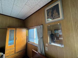 Fotografija v galeriji nastanitve 昭和レトロの民泊 正直屋 v mestu Chikuma