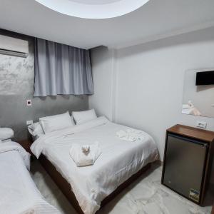 Postel nebo postele na pokoji v ubytování del ceilo hotell + 37 fotografií