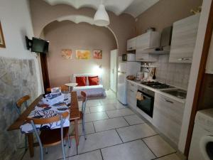 Kuchyň nebo kuchyňský kout v ubytování Vecchio Treno guest house