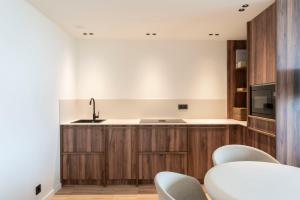 Kuchyň nebo kuchyňský kout v ubytování Dormideira + 24 fotografií