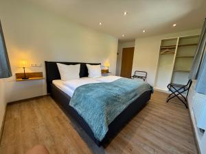 Postel nebo postele na pokoji v ubytování Ferienwohnung Bergsonne