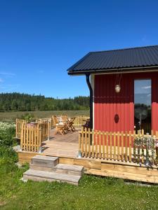 Zahrada ubytování Stuga i idyllisk lantlig miljö + 18 fotografií