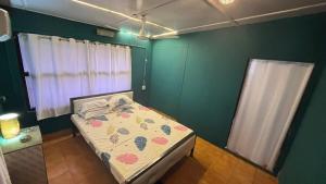 Postel nebo postele na pokoji v ubytování Emon's Corner + 8 fotografií