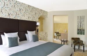 Postel nebo postele na pokoji v ubytování La Maison de Mathilde