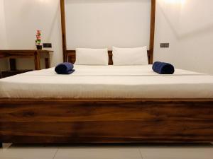 Katil atau katil-katil dalam bilik di Alice Rest Arugambay