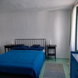 Ένα ή περισσότερα κρεβάτια σε δωμάτιο στο Casa Zita