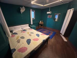 Postel nebo postele na pokoji v ubytování Emon's Corner