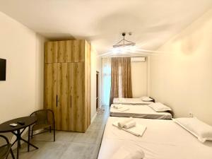 Letto o letti in una camera di Hotel Barbare
