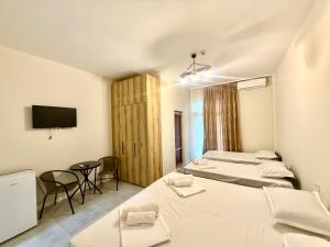Letto o letti in una camera di Hotel Barbare