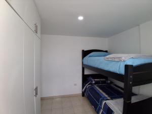 Postel nebo postele na pokoji v ubytování Residence FasMin B&B Nayon experience boxing
