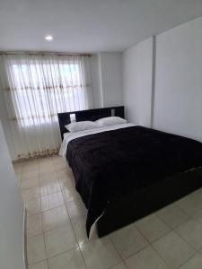 Postel nebo postele na pokoji v ubytování Residence FasMin B&B Nayon experience boxing