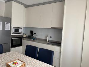 Η κουζίνα ή μικρή κουζίνα στο Apartamento moderno frente al mar
