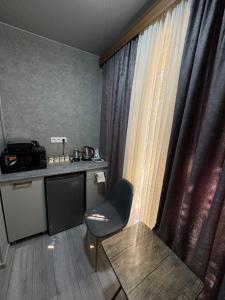 Kuchyň nebo kuchyňský kout v ubytování Villa Platinum