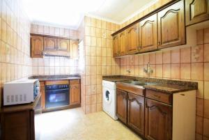 Kuchyňa alebo kuchynka v ubytovaní Apartamento muy cerca de la playa